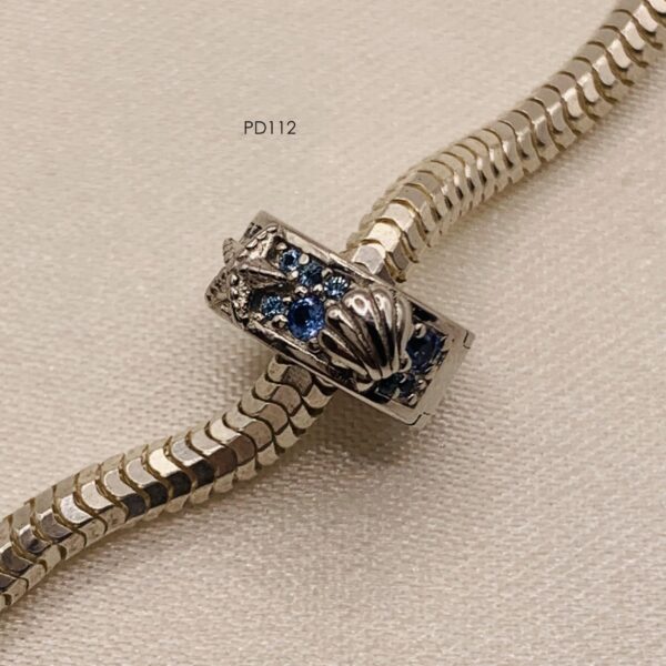 PD112 Plata charm