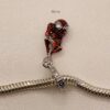 PD116 Plata charm